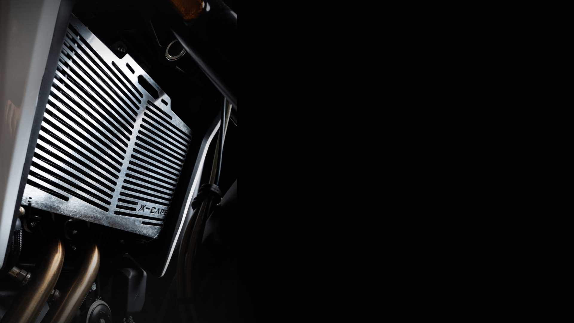 X-Cape-700-radiator-guard-desktop-editorial